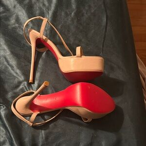 Elegant Nude 6 inch Stiletto Heels with platform. Red sole. Size 38 or 8 us.